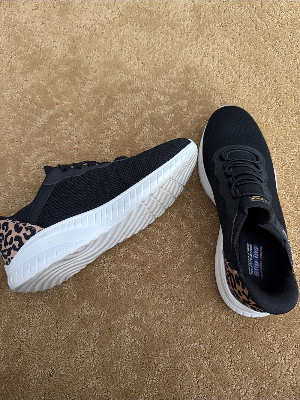 Skechers Women's Black Slip-On Sneakers with Leopard Accent worn once